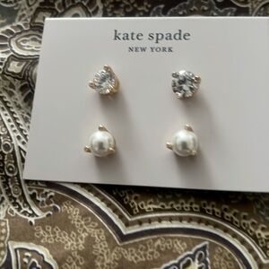 Two pair of earrings one pearl and one diamond. Never used.